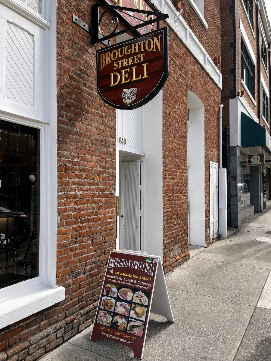 Broughton Street Deli hanging sign and entrance at 648 Broughton Street