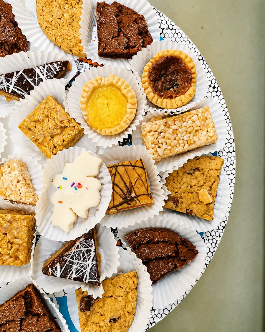 Assorted tarts and sweet squares on a serving platter